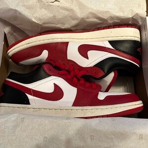 Women’s air Jordan 1 Low shoes. Worn once. Excellent/new condition.